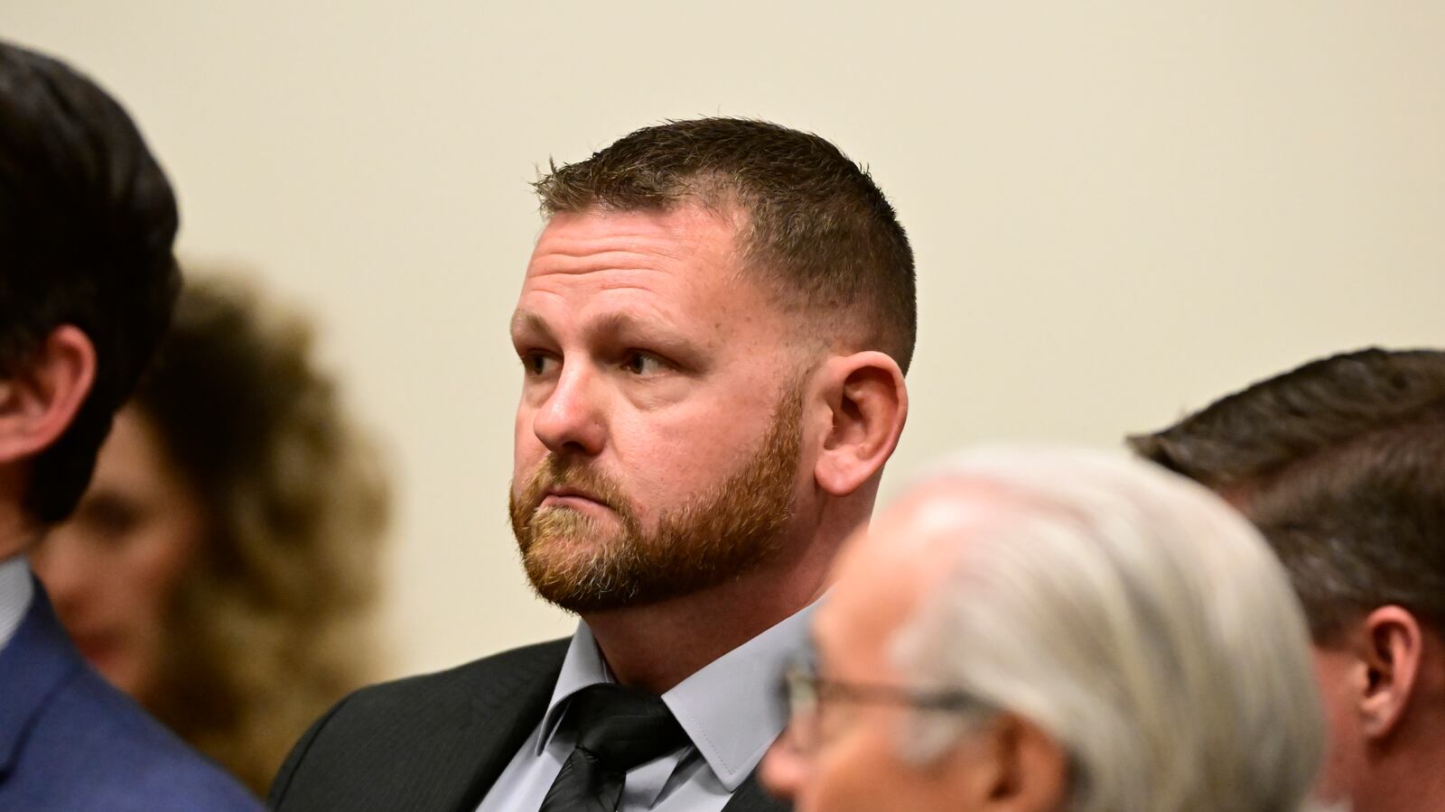 Aurora Police officer Randy Roedema, center, during an arraignment in the Adams County district court at the Adams County Justice Center January 20, 2023.