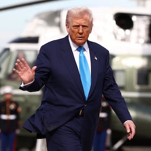 U.S. President Donald Trump walks from Marine One to board Air Force One to depart Haneda Airport for South Korea, in Tokyo, Japan, October 29, 2025. REUTERS/Evelyn Hockstein
