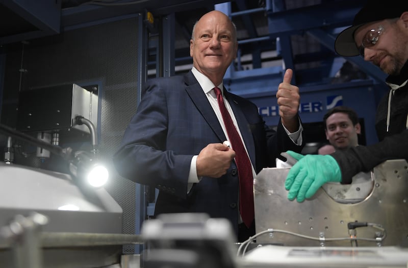 Brandon Beach, best known for exposing his coworkers in the Georgia government to COVID, holds the last penny stamped at the US Mint on November 12, 2025.