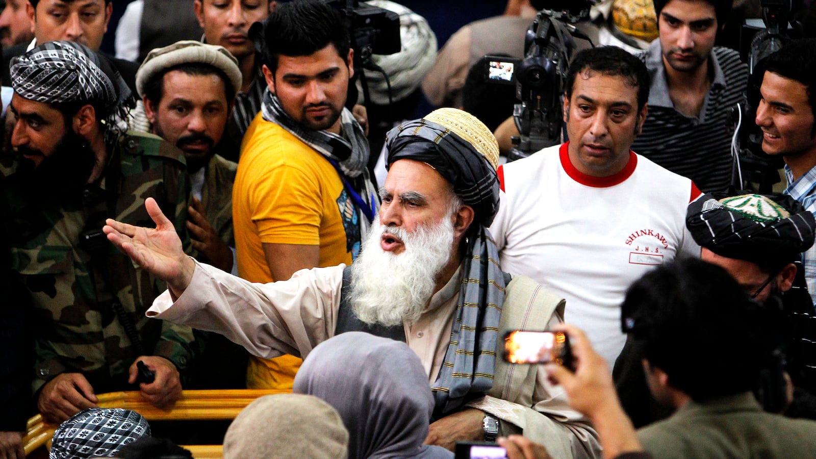 articles/2013/10/16/afghan-elections-the-warlords-are-back/131015-afghanistan-elections-sayyaf-tease_h0fbnw