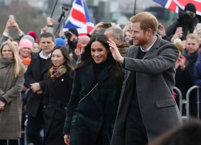 Prince Harry and Meghan Markle meet members of the British public at Edinburgh Castle in Scotland on February 13, 2018.