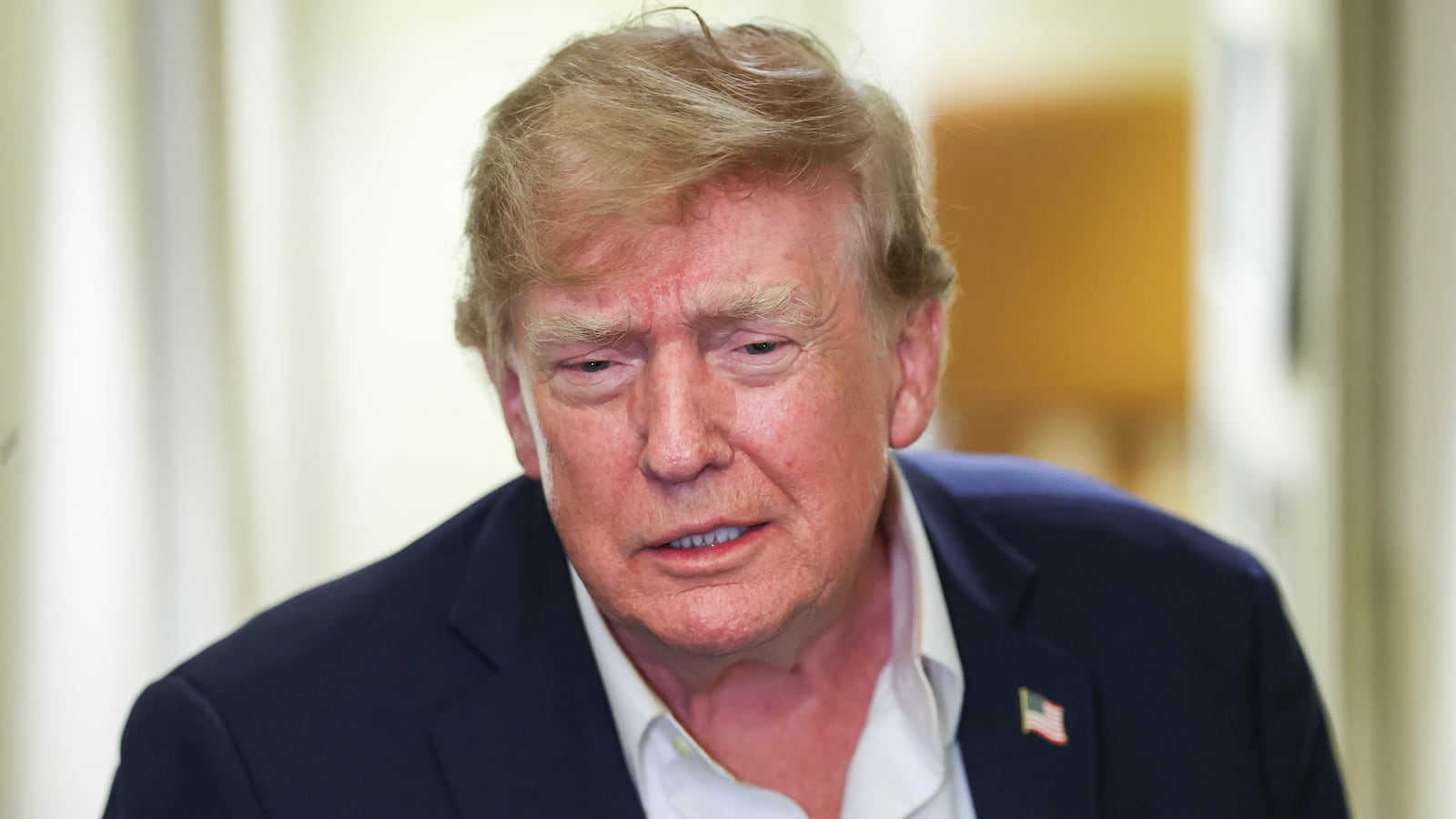 President Donald Trump speaks to reporters aboard Air Force One while traveling back from Ireland to Joint Base Andrews, Maryland on September 13, 2026 in flight.