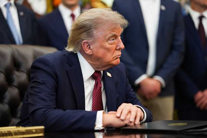 President Donald Trump was asked directly about whether he believed he was threatening war crimes, but he would not answer while speaking in the Oval Office on July 24, 2026.