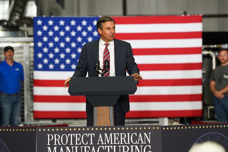 Former football coach and Republican candidate for Senate Derek Dooley, pictured speaking to Trump supporters in August 2025, was backed by Georgia Governor Brian Kemp in the GOP Senate race.