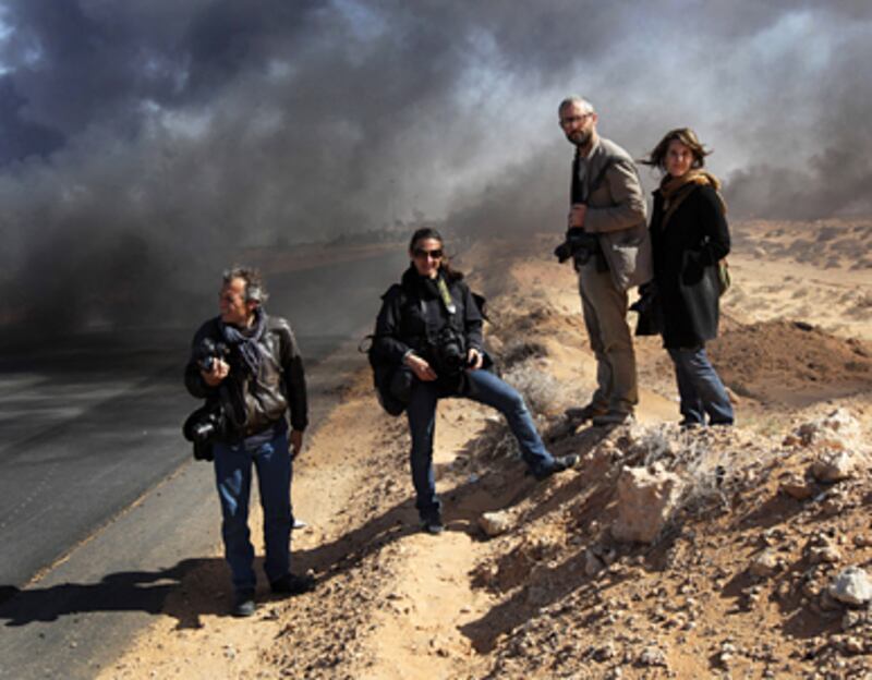 articles/2011/03/26/kidnapped-journalists-the-new-danger-in-the-middle-east/giglio-journalists_169492_uvw77s