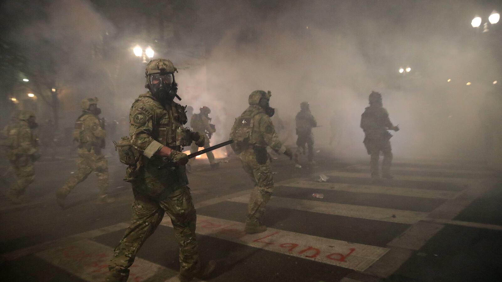 2020-07-26T084503Z_273088387_RC2W0I9WU2X3_RTRMADP_3_GLOBAL-RACE-PROTESTS-PORTLAND_ub6bh3