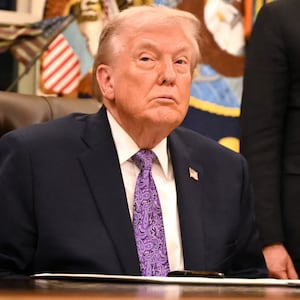 US President Donald Trump looks on during a signing ceremony on AI the Oval Office of the White House in Washington, DC, on December 11, 2025. (Photo by Alex WROBLEWSKI / AFP via Getty Images)