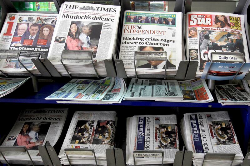 articles/2011/12/16/british-newspapers-circle-the-wagons/hacking-scandel-britain-newspapers-cathcart_ciqv9l