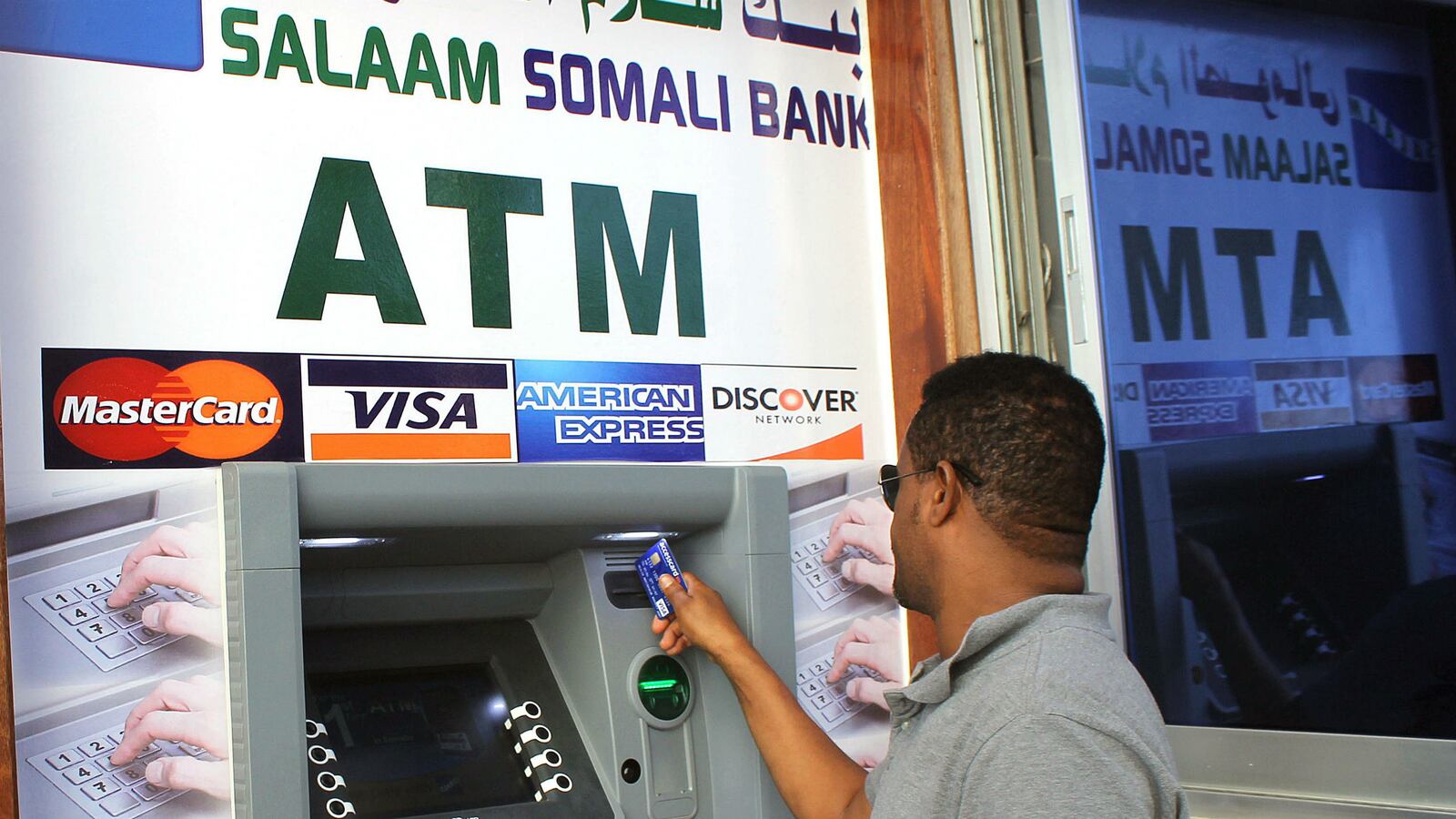 cheats/2014/10/10/somalia-installs-first-ever-atm/141010-somalia-atm-cheat_jj9mn5