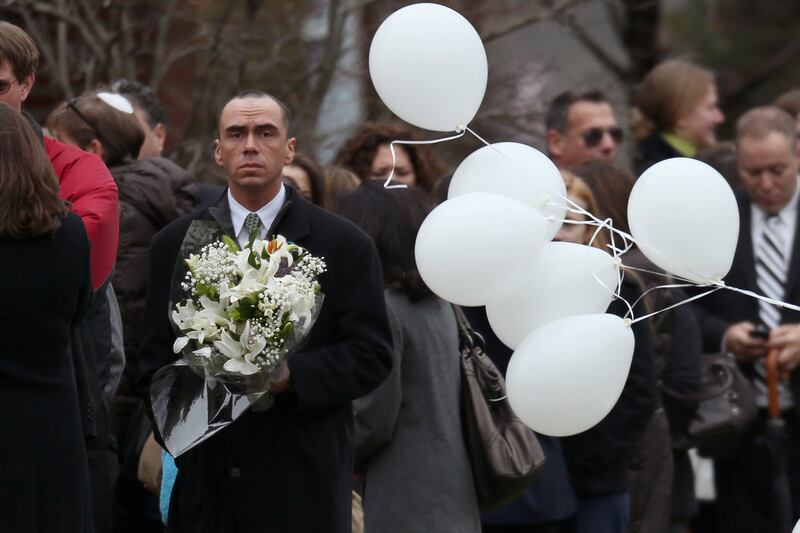 galleries/2012/12/17/newtown-funerals-the-faces-of-grief-photos/17shooting-funeral7_ylmo4t