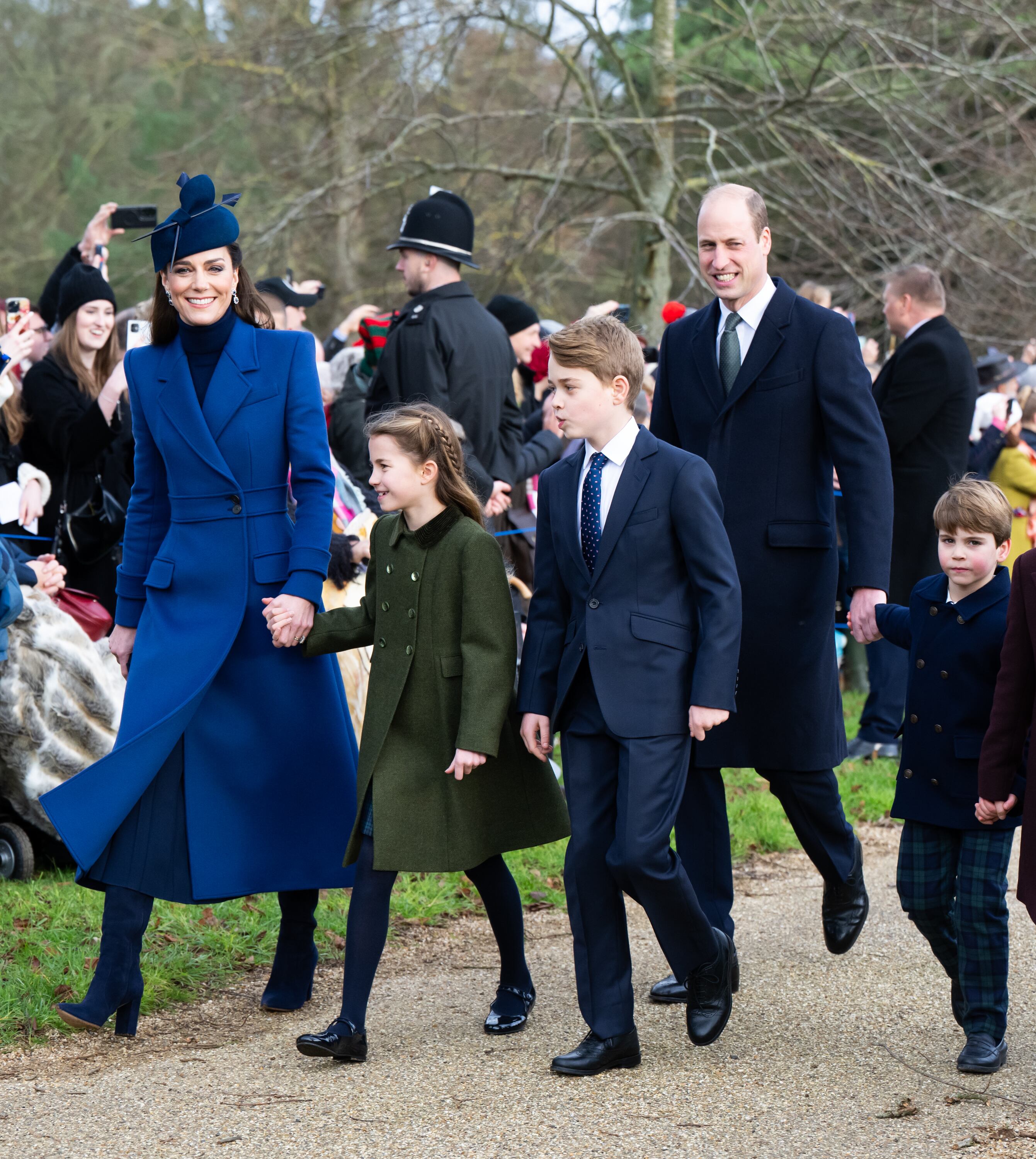 Princess Kate wore the same hat and coat at the Christmas Morning Service at Sandringham Church in 2023. Pictured with Princess Charlotte of Wales, Prince George of Wales, Prince William, Prince of Wales, and Prince Louis of Wales.