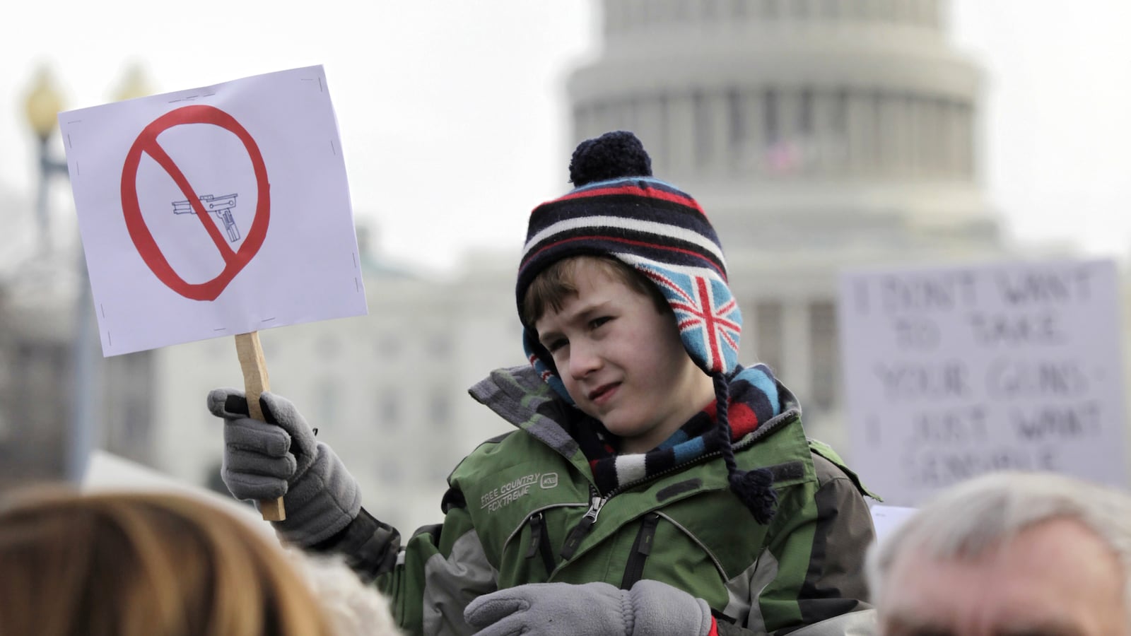 articles/2013/01/29/as-more-kids-die-handguns-still-a-bigger-threat-than-assault-rifles/130128-kid-carnage-daly-tease_dgov6o