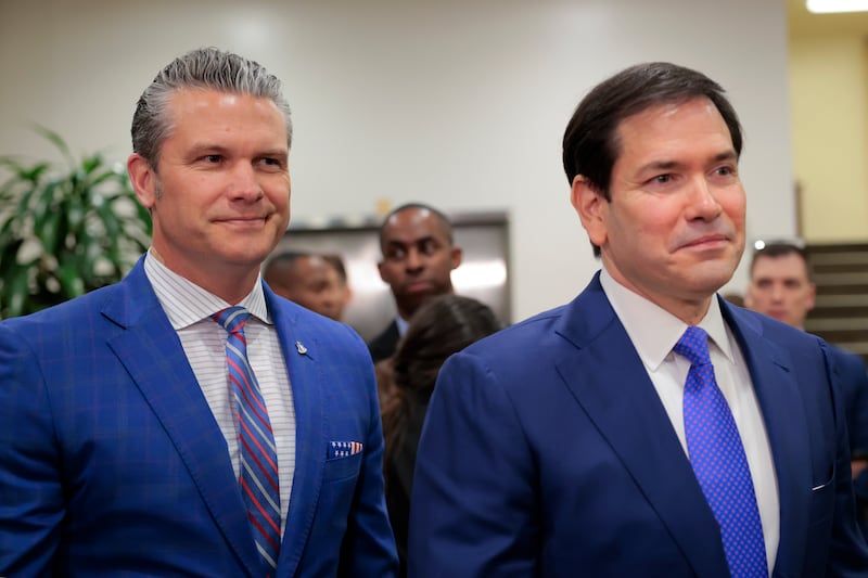 Defense Secretary Pete Hegseth and Secretary of State Marco Rubio look on following a closed door briefing with senators on the U.S. the capture of Venezuela’s Nicolas Maduro and his wife, Cilia Flores, at the U.S. Capitol on January 7, 2026 in Washington, DC.