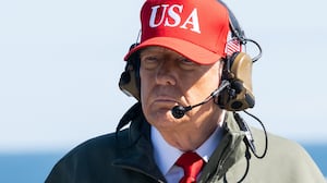 TOPSHOT - US President Donald Trump visits the USS George H.W. Bush aircraft carrier which is out at sea near Norfolk, Virginia, October 5, 2025, as he travels to see a Naval demonstration as part of the US Navy's 250th anniversary celebration, "America's Navy 250: Titans of the Sea - A Salute to the Fleet". (Photo by SAUL LOEB / AFP) (Photo by SAUL LOEB/AFP via Getty Images)