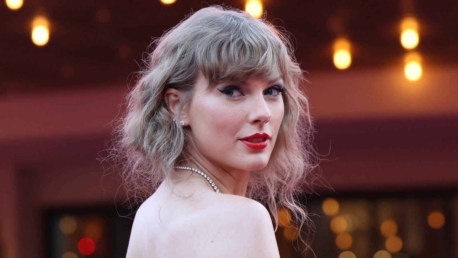 Taylor Swift attends a premiere for Taylor Swift: The Eras Tour