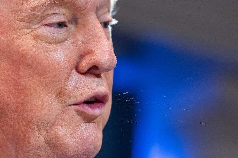 Donald Trump spitting