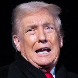 US President Donald Trump talks to the press as he walks to board Marine One at the White House in Washington, DC, on January 20, 2026. Trump is heading to the Swiss ski resort of Davos to attend the World Economic Forum (WEF). (Photo by SAUL LOEB / AFP via Getty Images)
