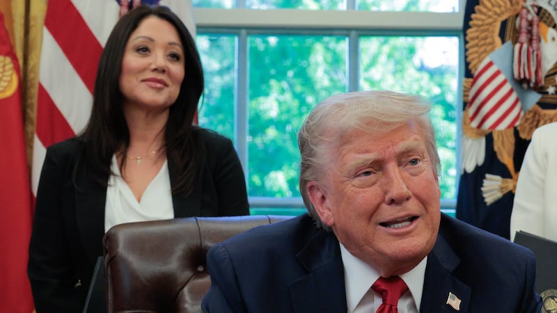 President Donald Trump speaks to the media as Secretary of Labor Lori Chavez-DeRemer look on after signing executive orders in the Oval Office at the White House on April 23, 2025 in Washington, DC.