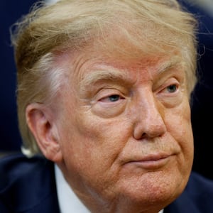 US President Donald J. Trump looks on as he makes an announcement on healthcare in the Oval Office at the White House in Washington, D.C., US, September 18, 2026. REUTERS/Evan Vucci