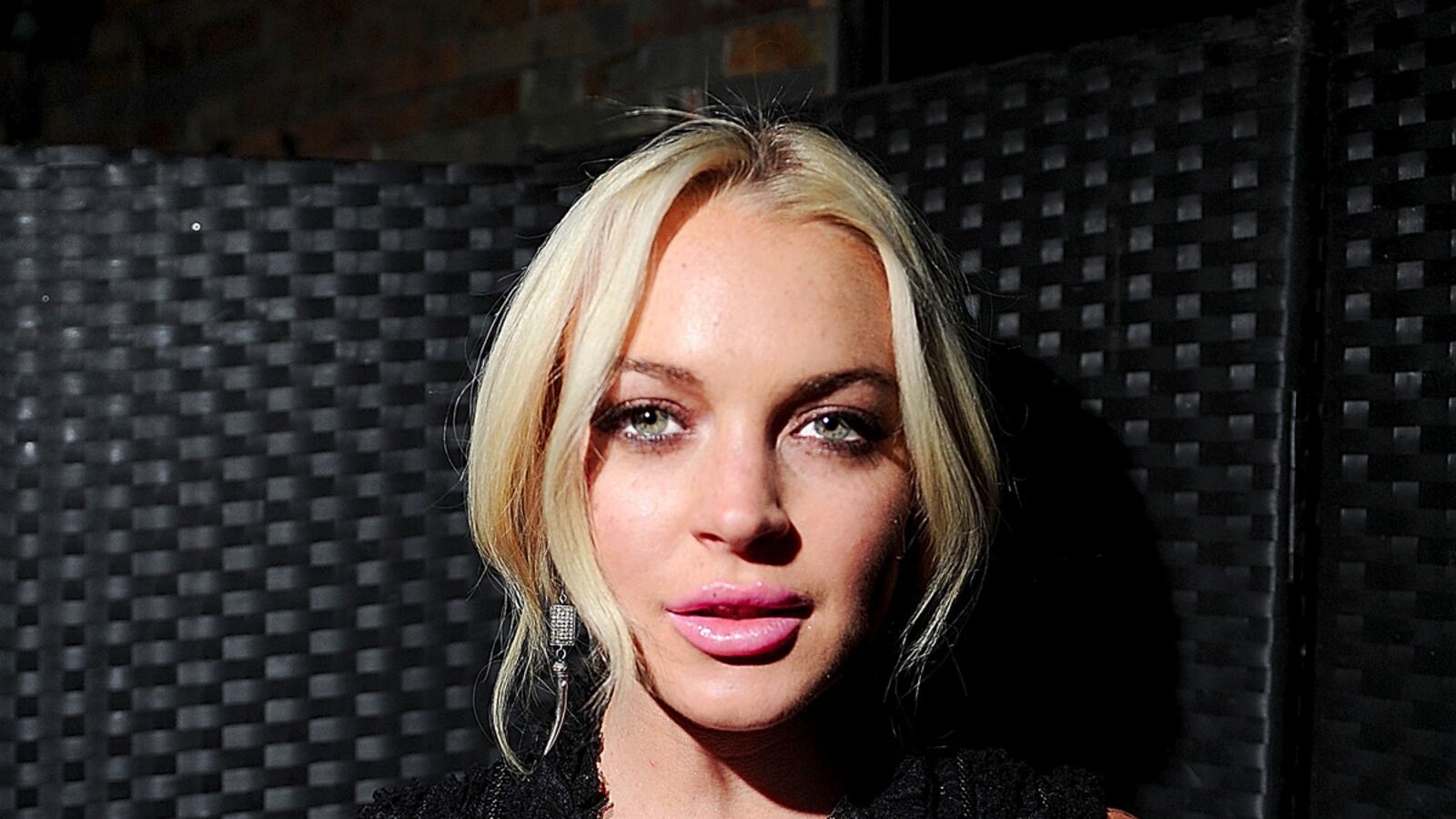 cheats/2011/12/07/lohan-s-playboy-cover-revealed/lindsay-lohan-bad-career-decisions-stern-tease_x8muhy