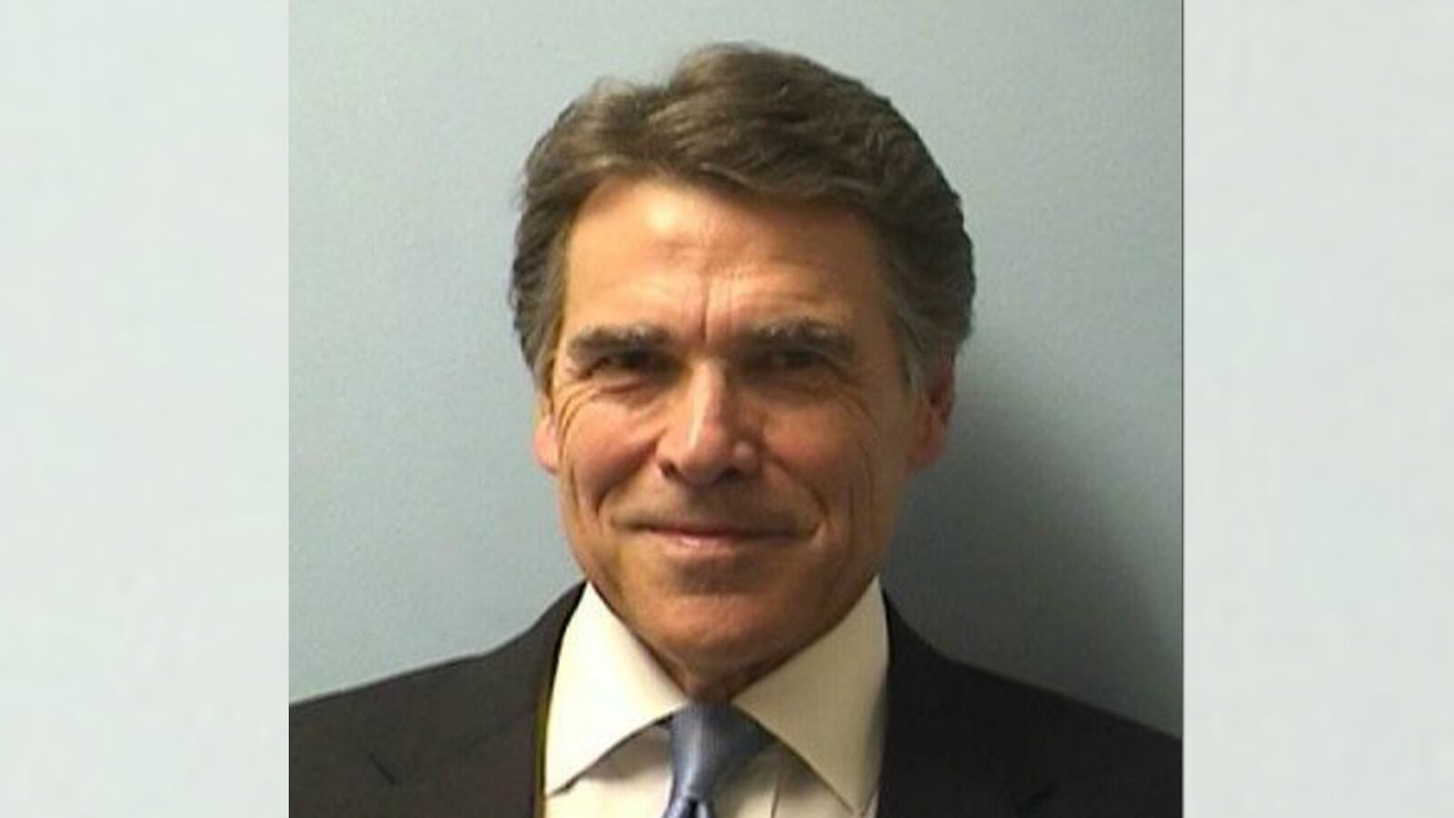 cheats/2014/08/19/rick-perry-booked-for-abuse-in-texas/140819-perry-mug-cheat_apnqc8