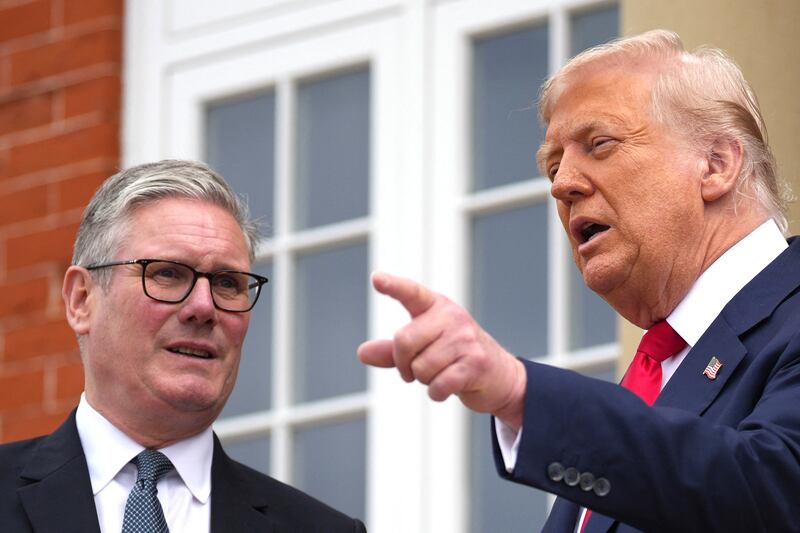 President Donald Trump (R) and Britain's Prime Minister Keir Starmer (L) speak with the media before a bilateral meeting at the Trump Turnberry Golf Courses, in Turnberry south west Scotland on July 28, 2025.