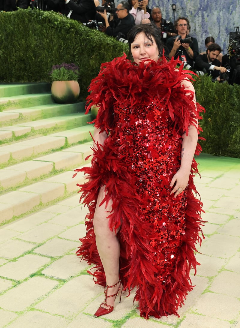 Lena Dunham poses during the Met Gala, an annual fundraising gala held for the benefit of the Metropolitan Museum of Art's Costume Institute with this year's theme 'Costume Art' in New York City