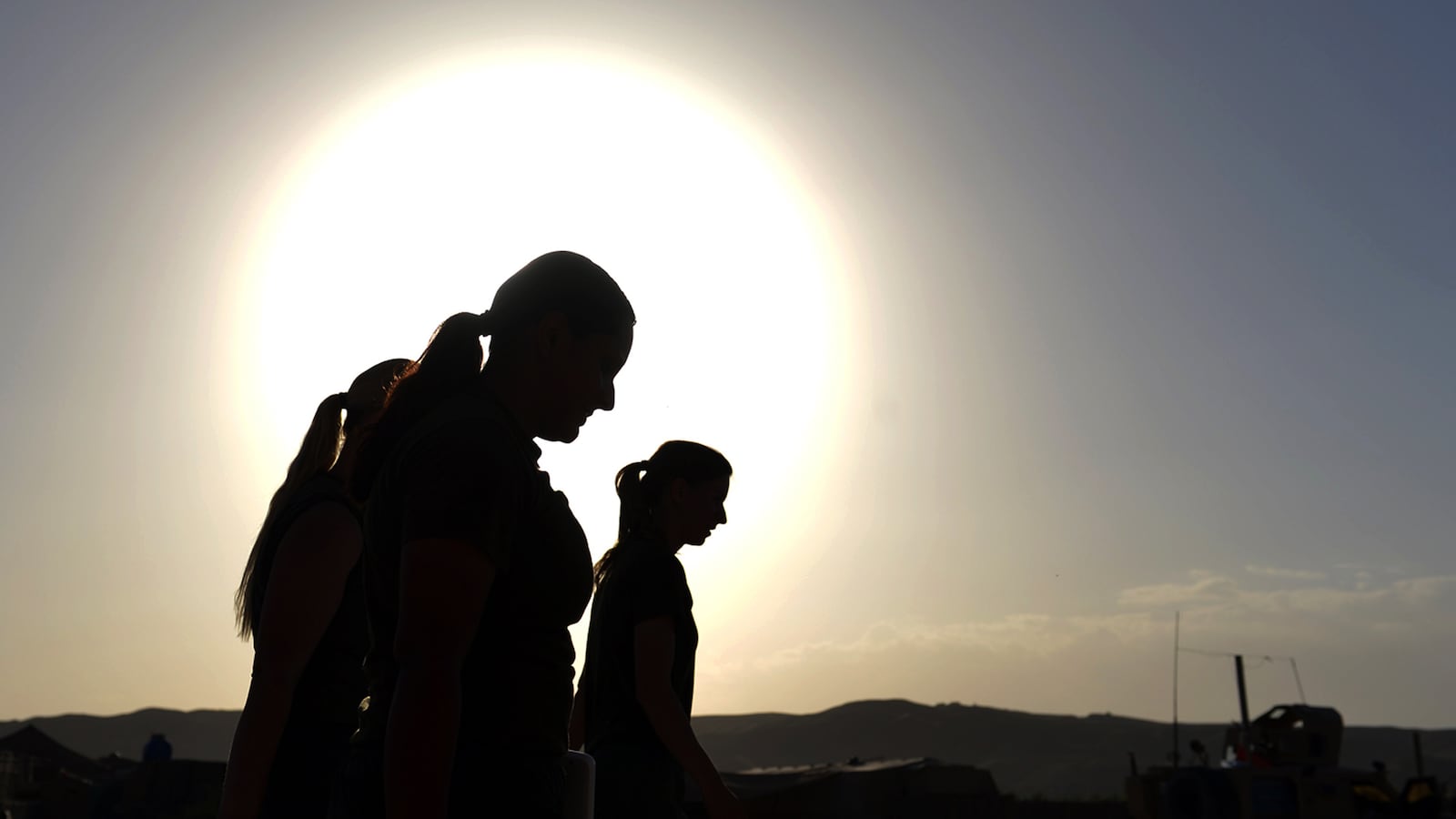 articles/2013/01/24/the-female-fighter-i-knew/130124-woods-women-combat-tease-embed_pwewht