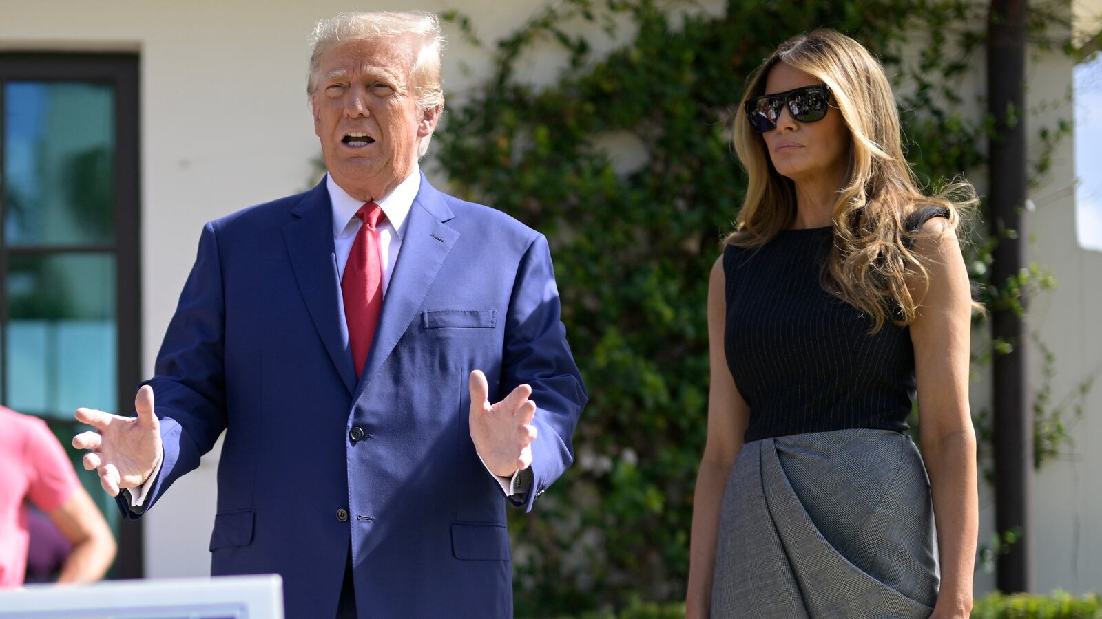 Former President Donald Trump addresses reporters after he and former First Lady Melania Trump voted.