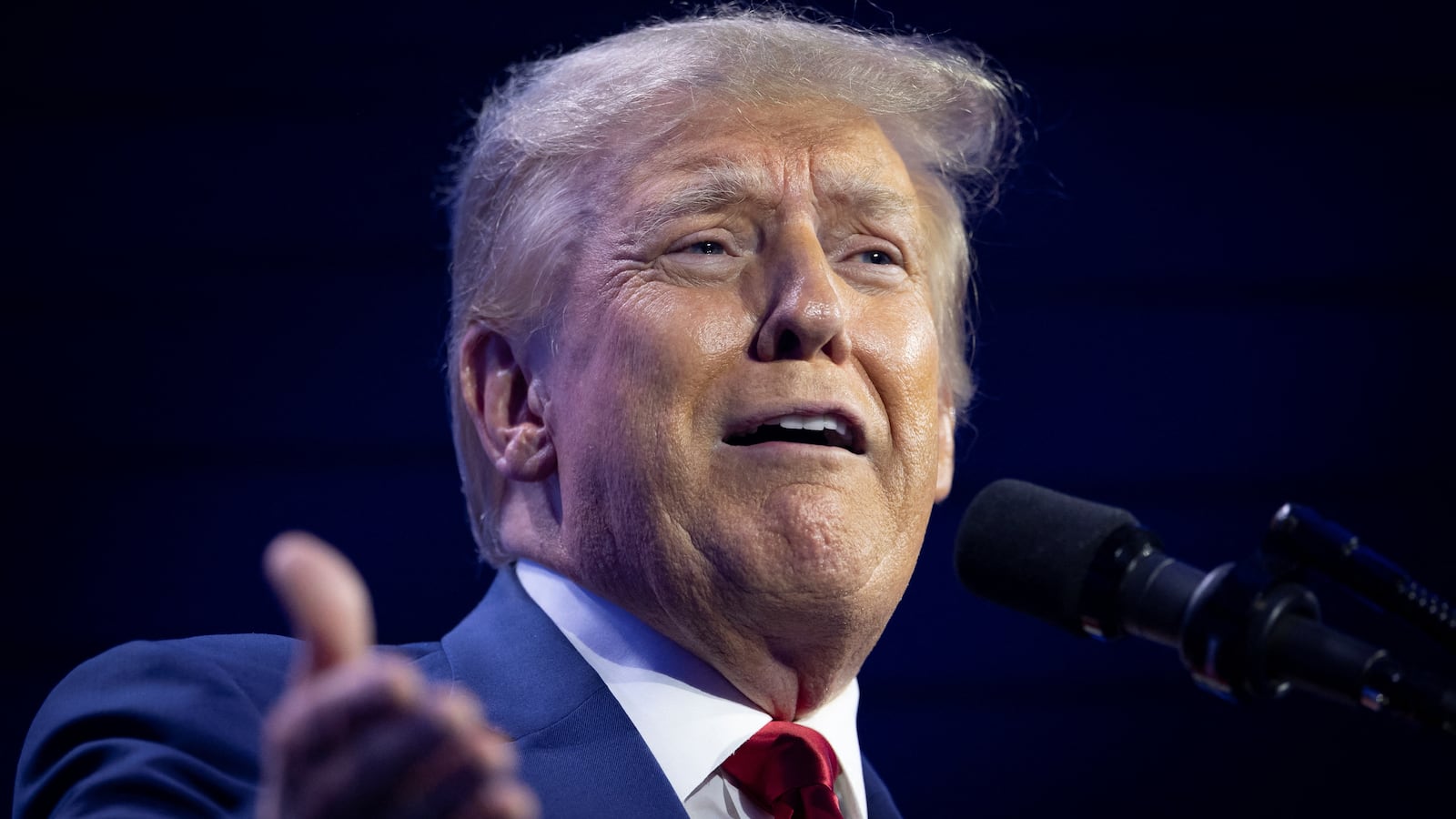 Donald Trump gestures as he speaks during the Turning Point Action Conference in West Palm Beach, Florida, July 15, 2023.