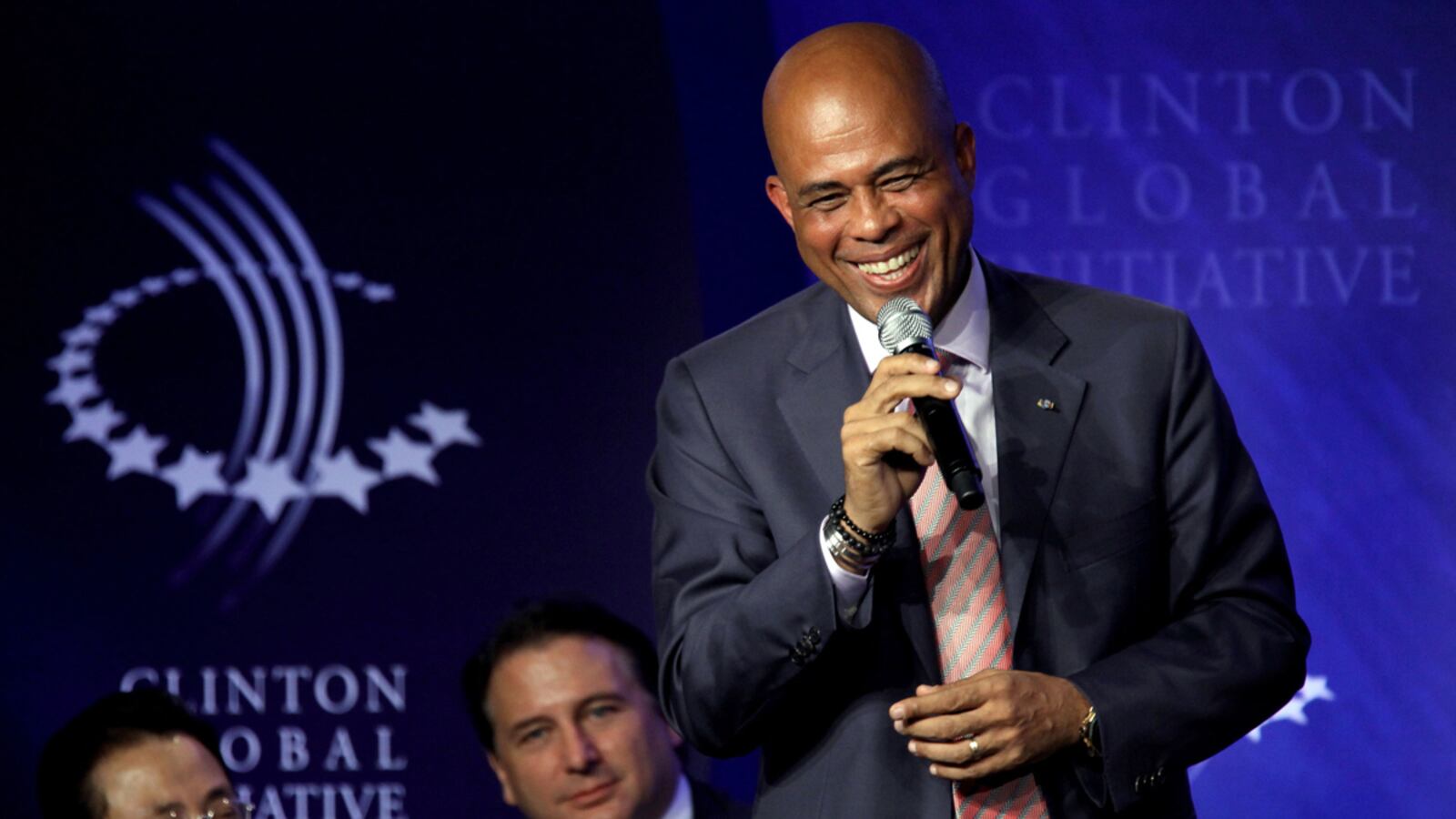 articles/2011/09/21/michel-martelly-haiti-s-new-president-gets-mixed-reviews/martelly-cgi-romano_d89uma