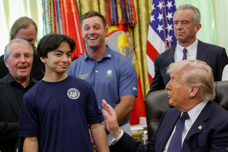 President Donald Trump speaks to young athletes as he is joined by (L-R) retired professional golfer Gary Player, professional golfer Bryson DeChambeau and U.S. Secretary of Health and Human Services Robert F. Kennedy Jr.