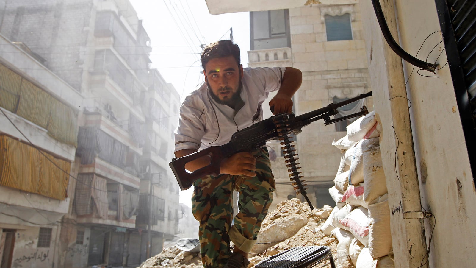 articles/2014/11/01/where-does-obama-stand-on-assad/141031-hassan-syria-tease_ltej1l