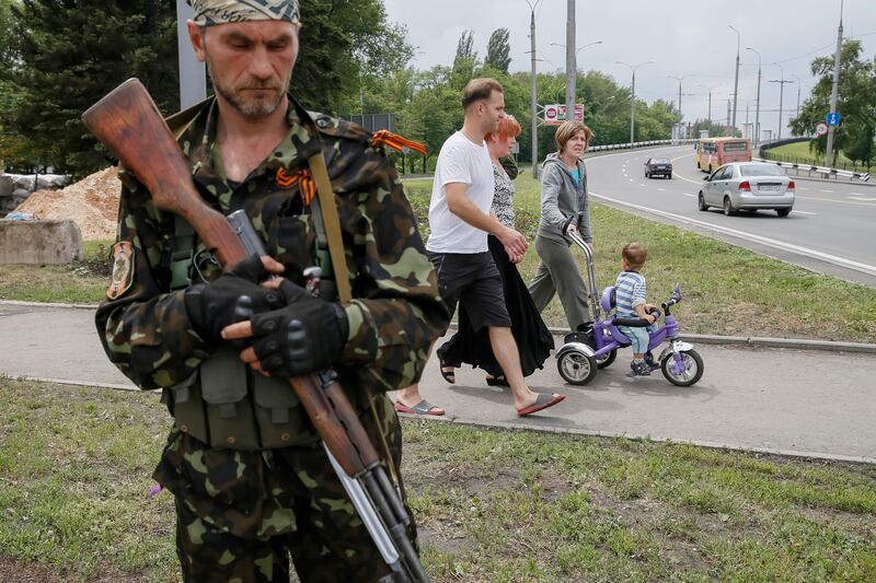 articles/2014/06/02/mom-and-pop-on-ukraine-s-battle-line/140602-ukraine-families-nemtsova-tease_zpzqf5
