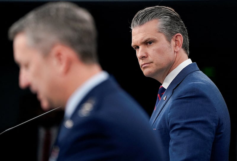 U.S. Secretary of Defense Pete Hegseth and Chairman of the Joint Chiefs of Staff General Dan Caine hold a briefing amid the U.S.-Israeli conflict with Iran, at the Pentagon in Washington, D.C., U.S., March 2, 2026. REUTERS/Elizabeth Frantz