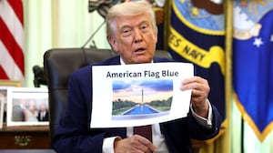 President Donald Trump displays a rendering of his proposed renovations to the Lincoln Memorial Reflecting Pool during an event in the Oval Office of the White House on June 03, 2026 in Washington, DC. The landmark is being painted as part of President Trump's efforts to repair Washington D.C. in preparation for the Nation's 250th birthday.