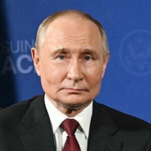 Russian President Vladimir Putin looks on during a US-Russia summit on Ukraine with US President Donald Trump at Joint Base Elmendorf-Richardson in Anchorage, Alaska, on August 15, 2025. US President Donald Trump and his Russian counterpart Vladimir Putin shook hands and exchanged greetings Friday as they arrived at a military base in Alaska for a historic summit on Moscow's war in Ukraine.