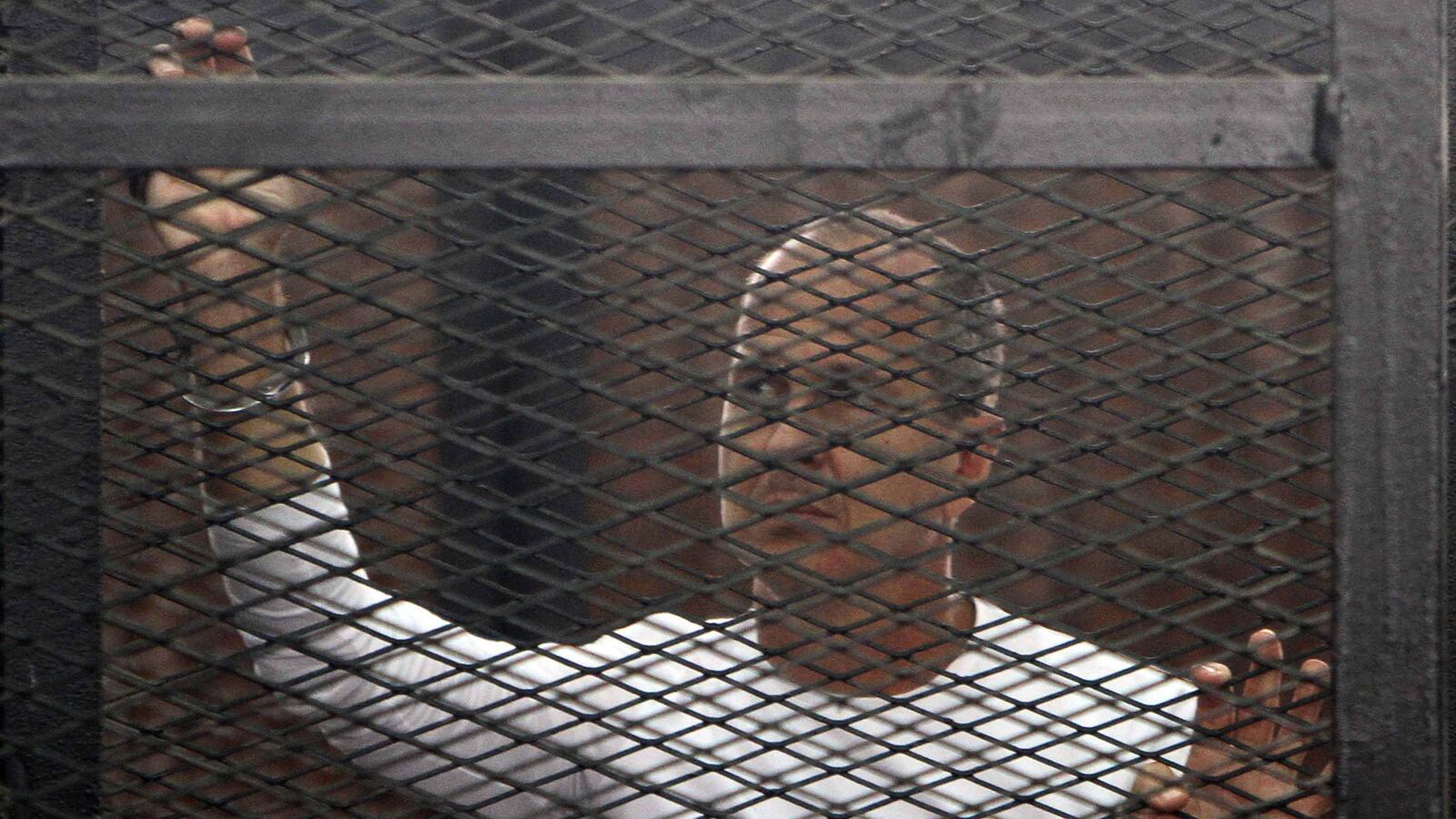 articles/2014/03/24/al-jazeera-journalists-are-on-trial-in-egypt-for-doing-their-jobs/140324-rosenfeld-egypt-tease_suxiih