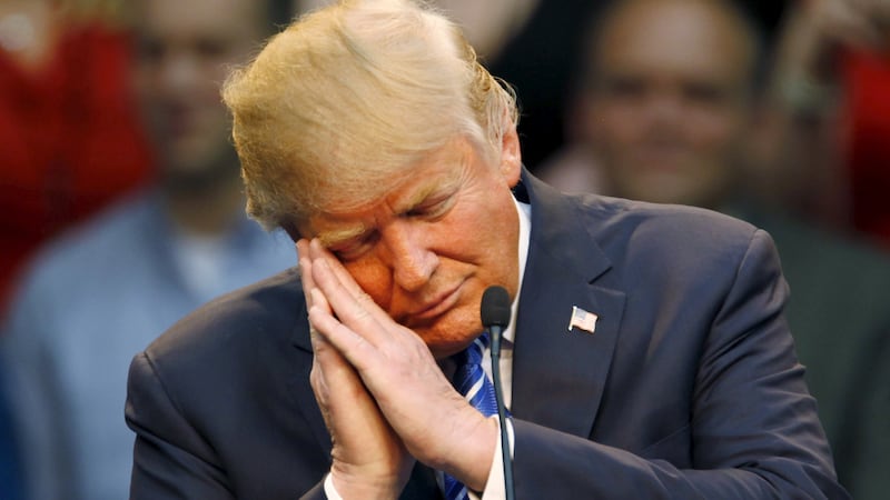 Donald Trump pretends to fall asleep (which he actually often does in Oval Office meetings) as he mocks a political opponent in a past presidential campaign.