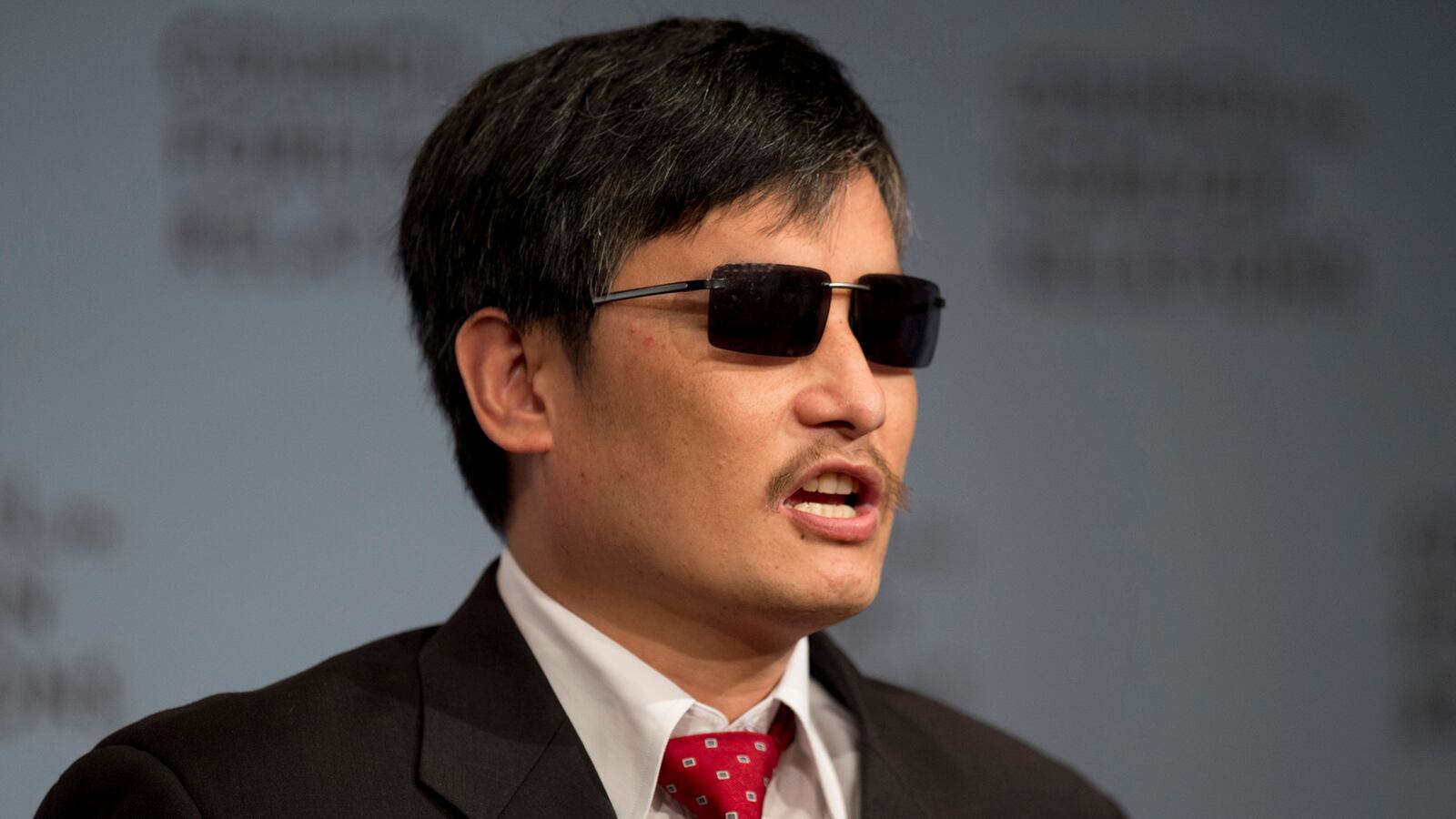 cheats/2012/06/13/chen-guangcheng-s-family-suffers-in-china/chen-brother-china-cheat_lz7hrq