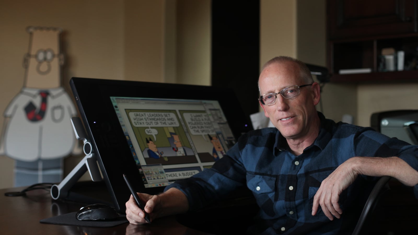 Scott Adams, cartoonist and author and creator of "Dilbert", poses for a portrait in his home office on Monday, January 6, 2014 in Pleasanton, Calif. Adams has published a new memoir "How to Fail at Almost Everything and Still Win Big: Kind of the Story of My Life". (Photo By Lea Suzuki/The San Francisco Chronicle via Getty Images)