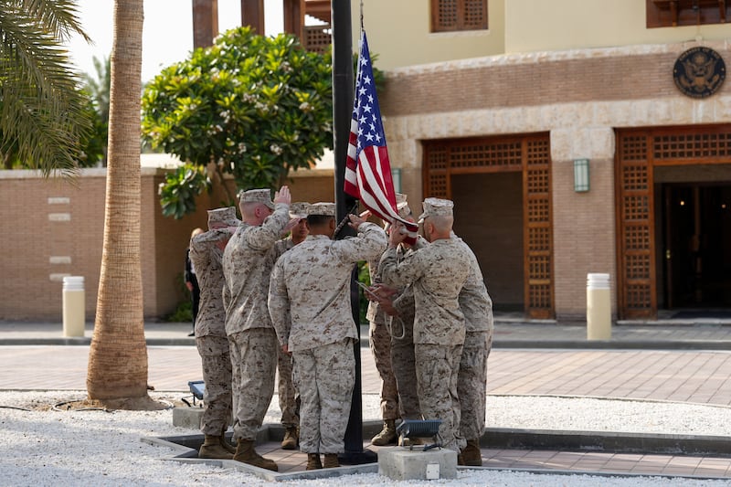 U.S. Marines raise the flag at the U.S. embassy in Kuwait during a ceremony attended by U.S. Secretary of State Marco Rubio amid his visit to the Middle East to discuss the interim deal between the U.S. and Iran with Arab Gulf allies, in Kuwait City, Kuwait, June 24, 2026. REUTERS/Eric Lee/Pool