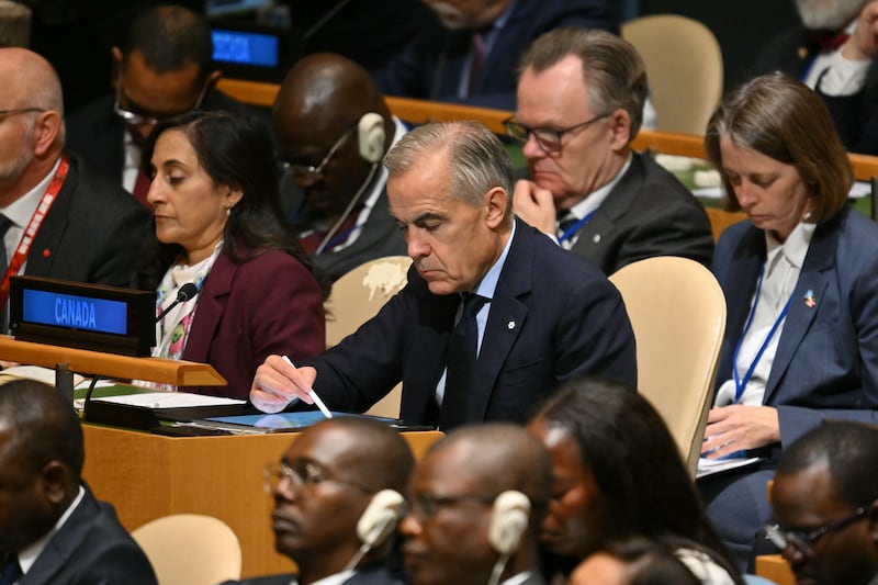 Canadian Prime Minister Mark Carney listens to US President Donald Trump address the 81st United Nations General Assembly at United Nations headquarters in New York on September 22, 2026. (Photo by ANGELA WEISS / AFP via Getty Images)