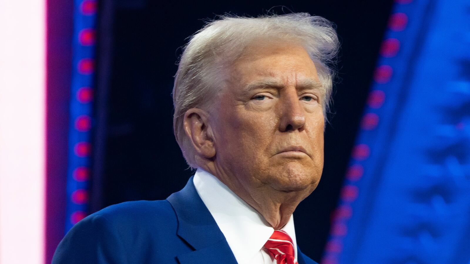 PHOENIX, ARIZONA - DECEMBER 22: U.S. President-elect Donald Trump looks on during Turning Point USA's AmericaFest at the Phoenix Convention Center on December 22, 2024 in Phoenix, Arizona. The annual four day conference geared toward energizing and connecting conservative youth hosts some of the country's leading conservative politicians and activists. (Photo by Rebecca Noble/Getty Images)