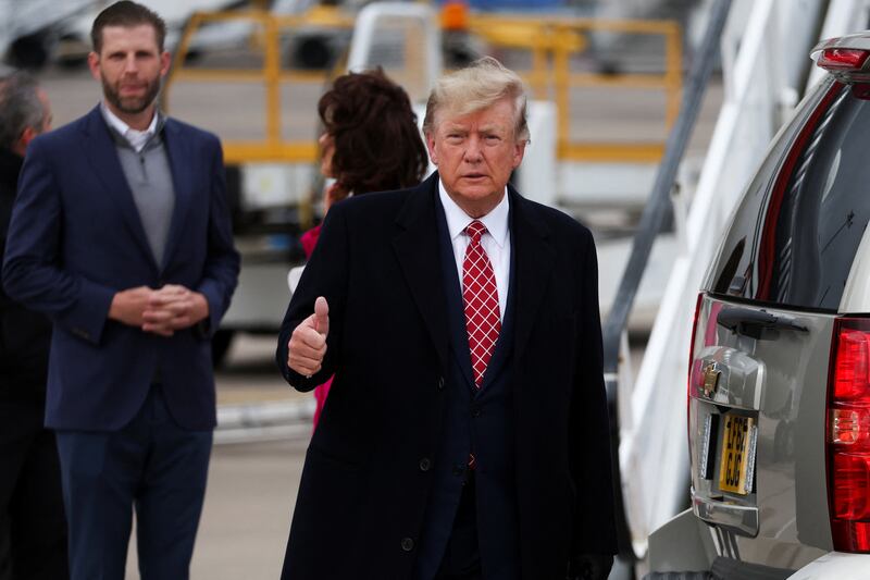 Former U.S. President and Republican presidential candidate Donald Trump gestures after arriving at Aberdeen International Airport in Aberdeen, Scotland, Britain May 1, 2023. REUTERS/Russell Cheyne