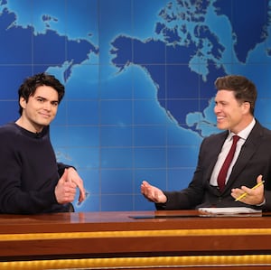 SATURDAY NIGHT LIVE -- Episode 1882 -- Pictured: (l-r) Michael Longfellow and anchor Colin Jost during Weekend Update on Saturday, May 3, 2025 -- (Photo by: Will Heath/NBC via Getty Images)
