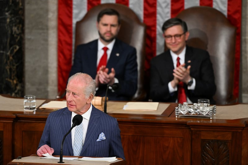 Vice President JD Vance and Speaker Mike Johnson applaud King Charles during his address to a joint meeting of Congress in the House Chamber at the U.S. Capitol in Washington, U.S., April 28, 2026.