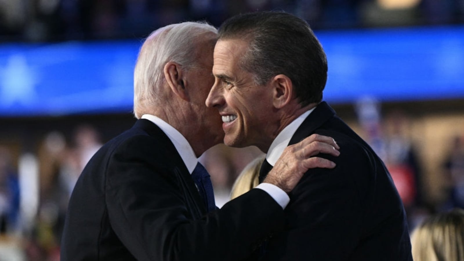 President Joe Biden and his son Hunter Biden hug on stage at the Democratic National Convention.