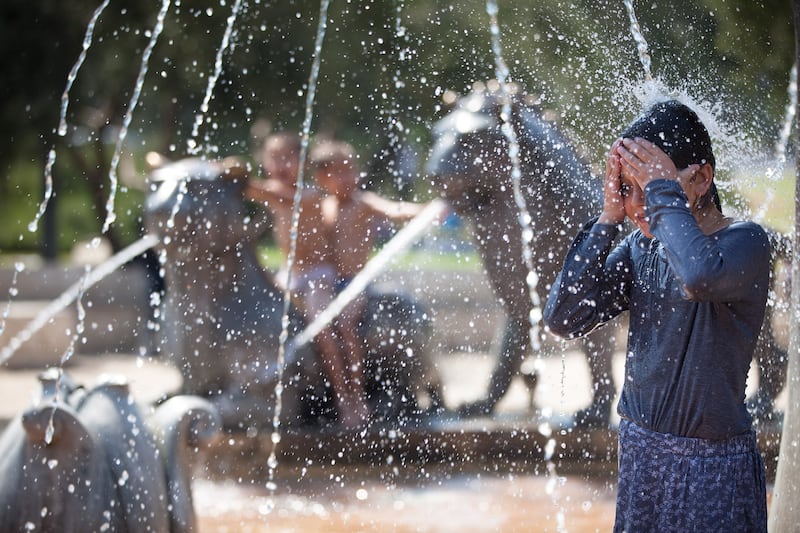 articles/2012/08/28/israeli-democracy-rises-to-the-occasion/kids-water-openz_ggmleb