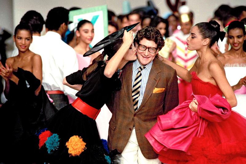 articles/2013/08/29/saint-laurent-may-revive-ysl-couture-gwyneth-paltrow-and-stella-mccartney-announce-mysterious-collaboration/yves-saint-laurent-archive-fashion-tease_j4wal2